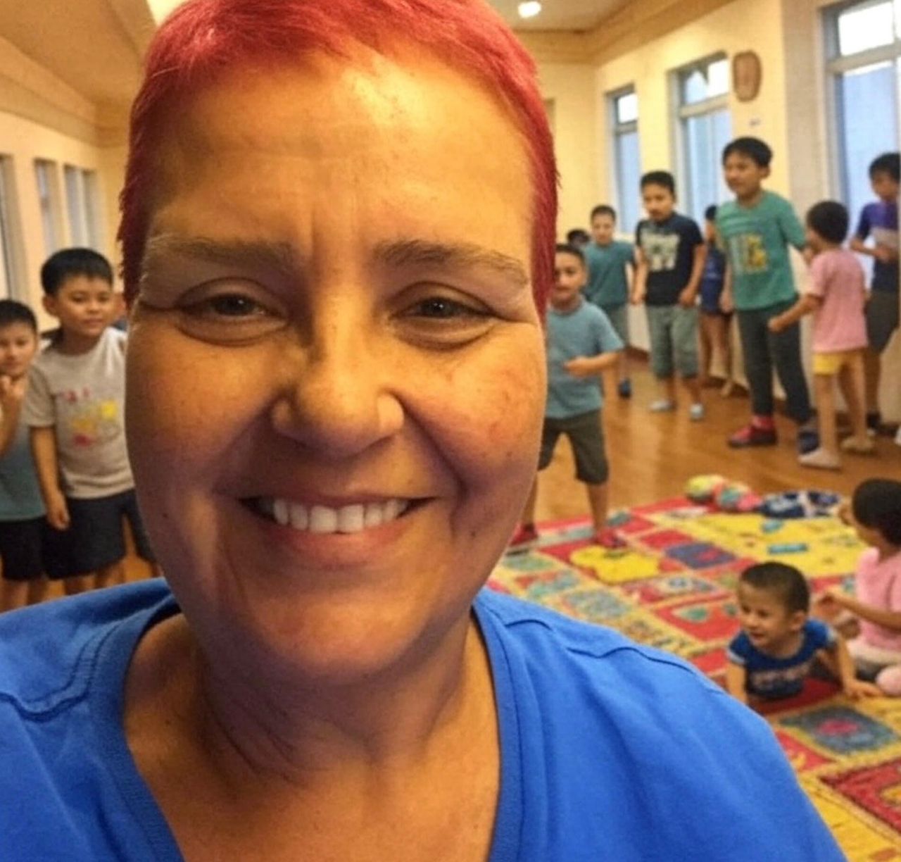 A family shares a meal at a community center in Malawi.